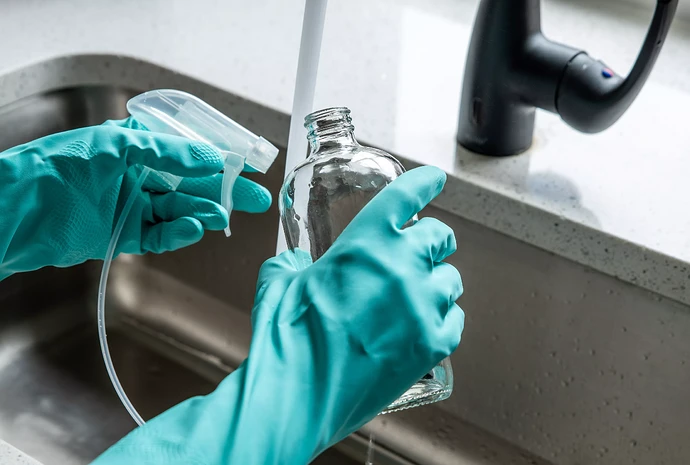 rinsing neem oil bottle